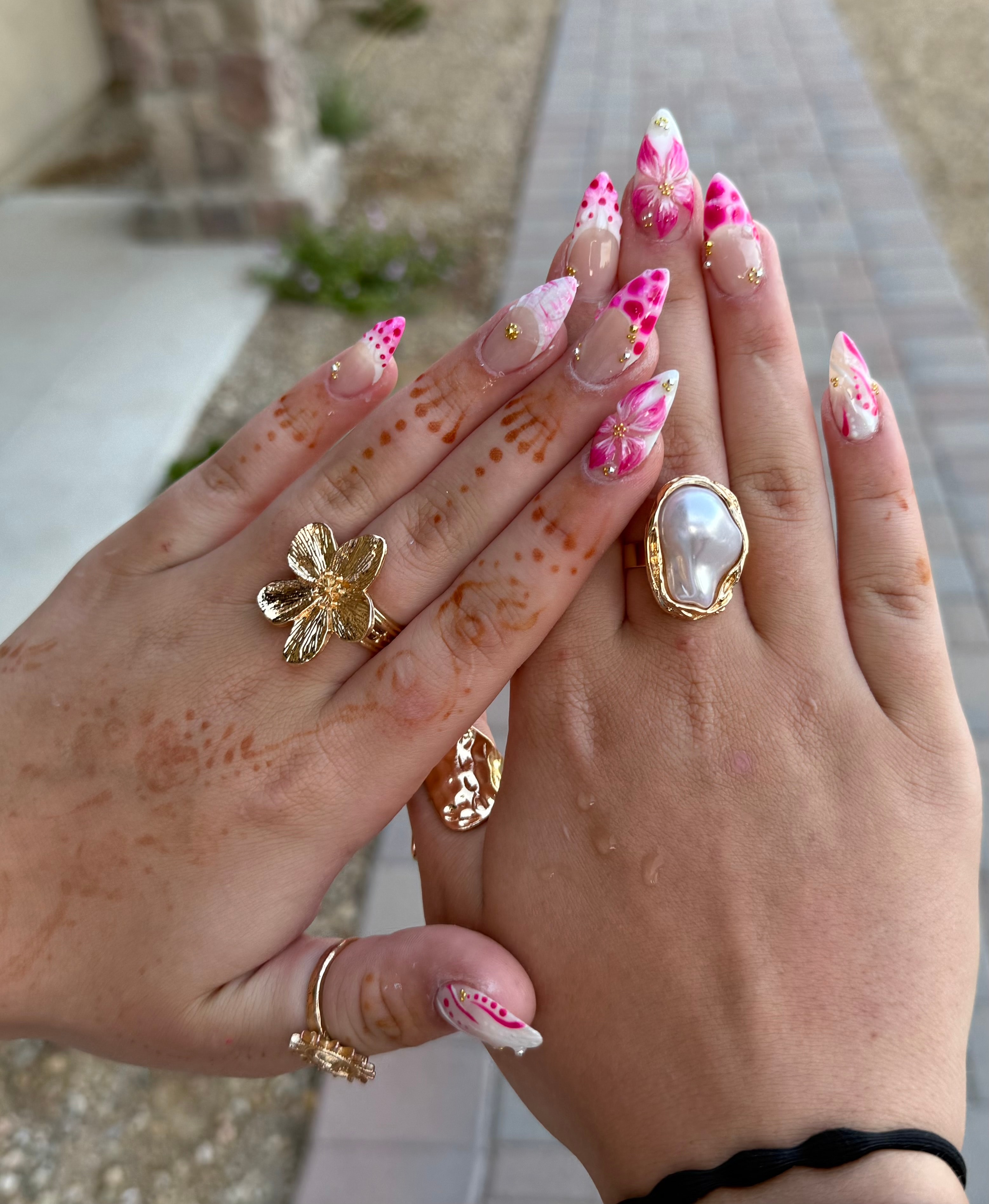 Shiny pink gel manicure close up
